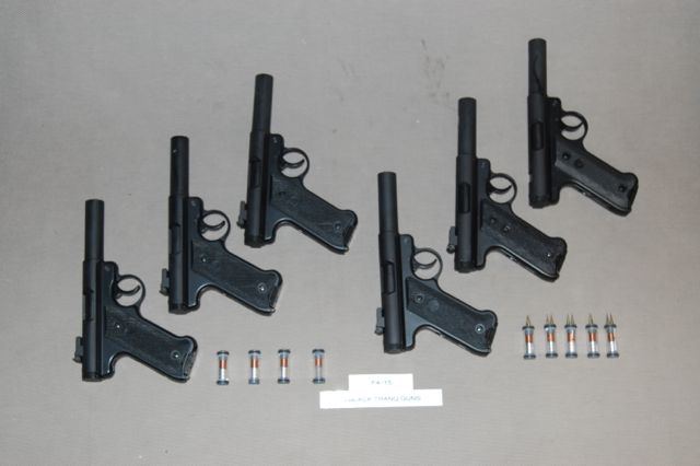 6 black tranq guns f4-15.jpg